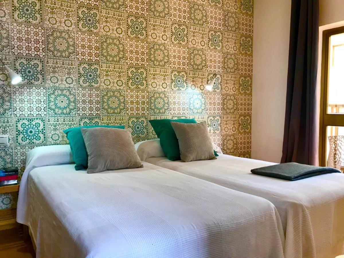 Hostal Guadalupe ตอร์เรโมลิโนส ภายนอก รูปภาพ